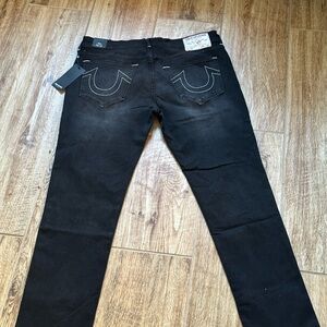 Men black and white True Religion Jeans